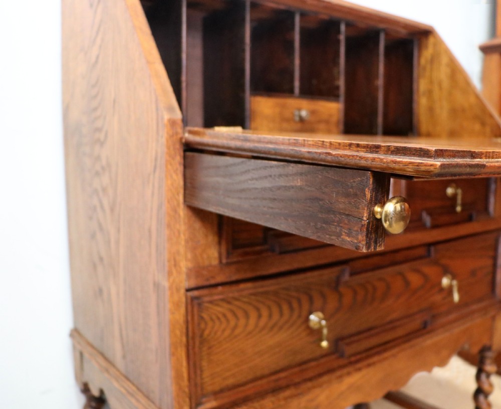 An absolutely charming Jacobean revival oak bureau. View XVII