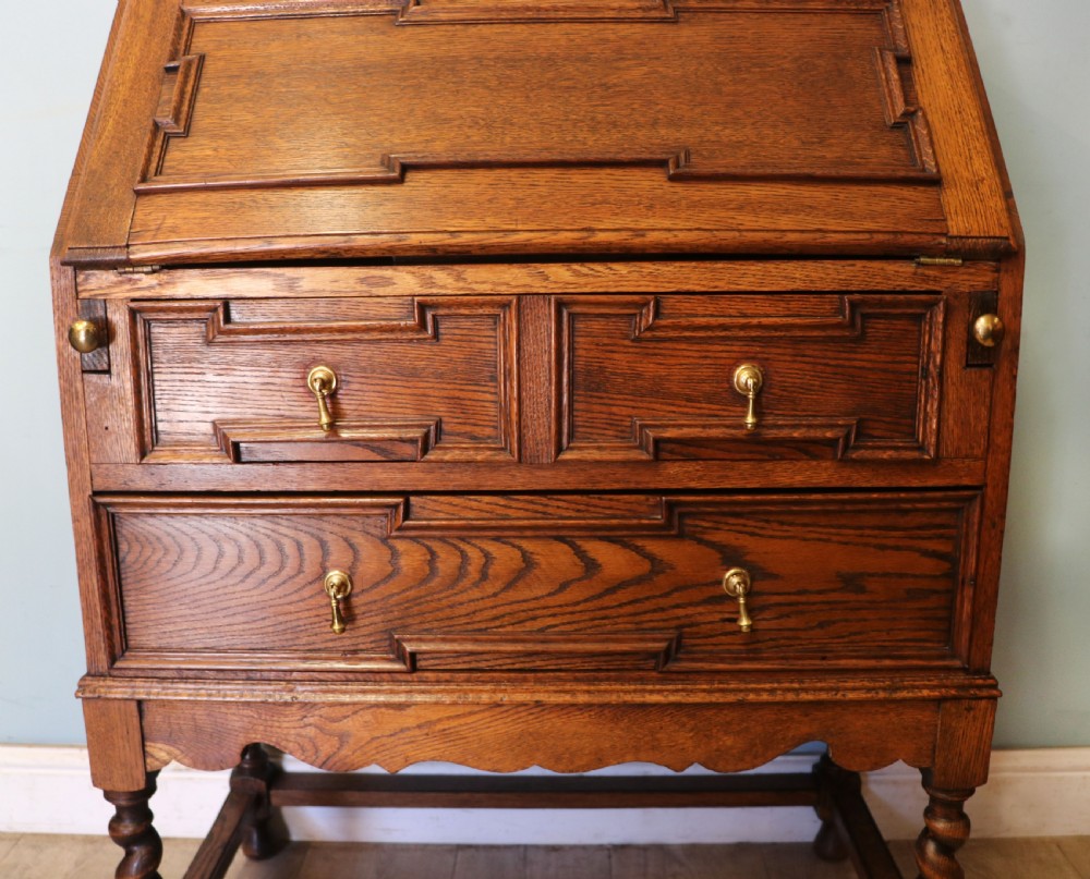 An absolutely charming Jacobean revival oak bureau. View XXI