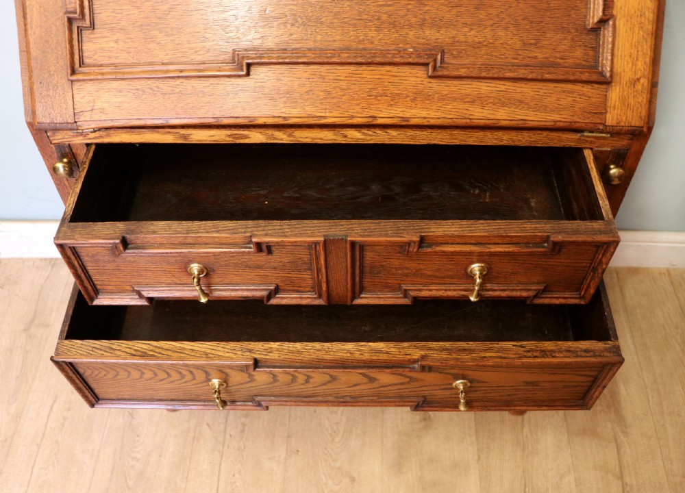 An absolutely charming Jacobean revival oak bureau. View XXIII