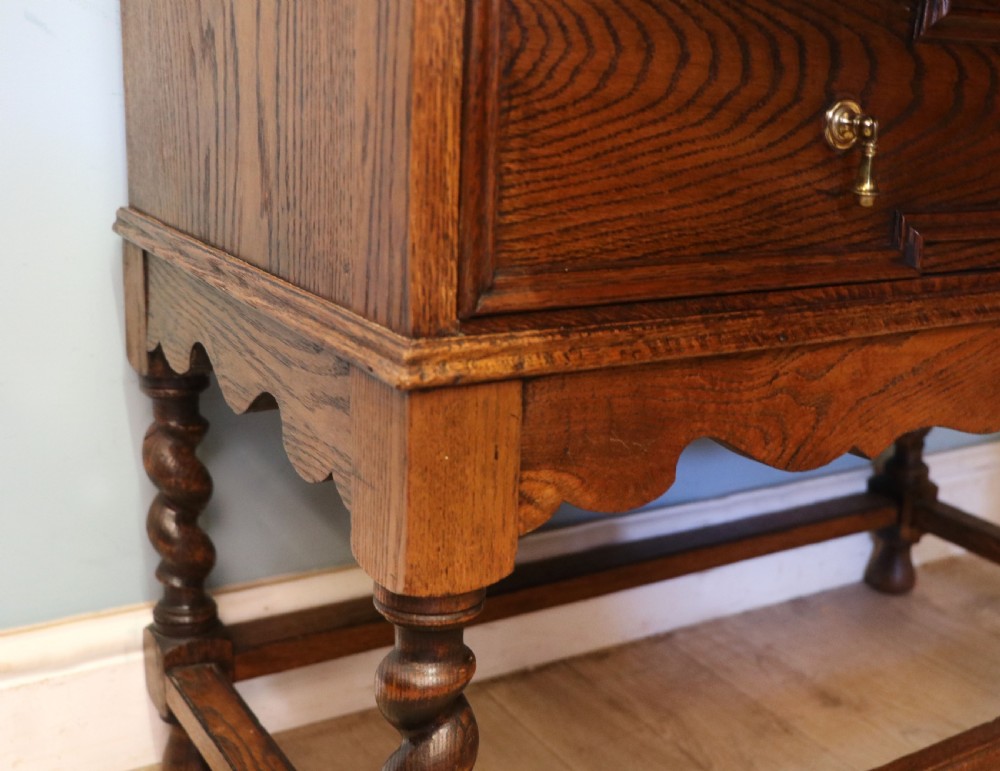 An absolutely charming Jacobean revival oak bureau. View XXV