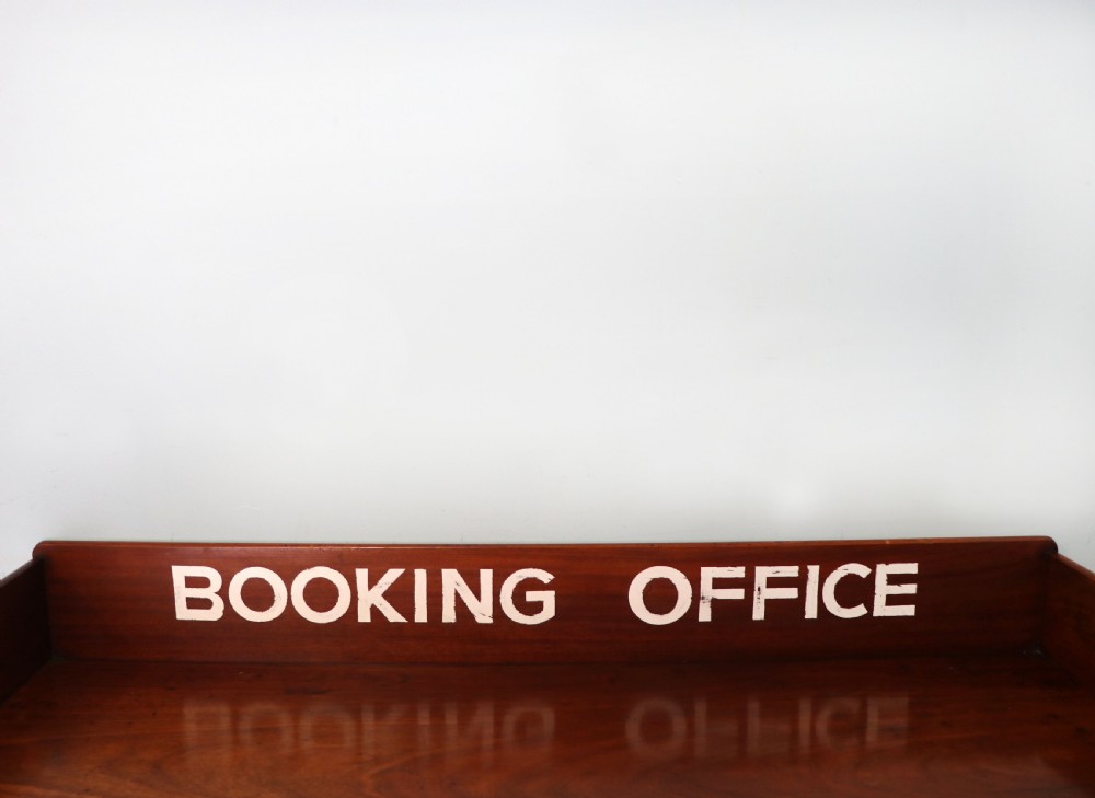 A lovely Victorian mahogany table later sign written booking office. View V