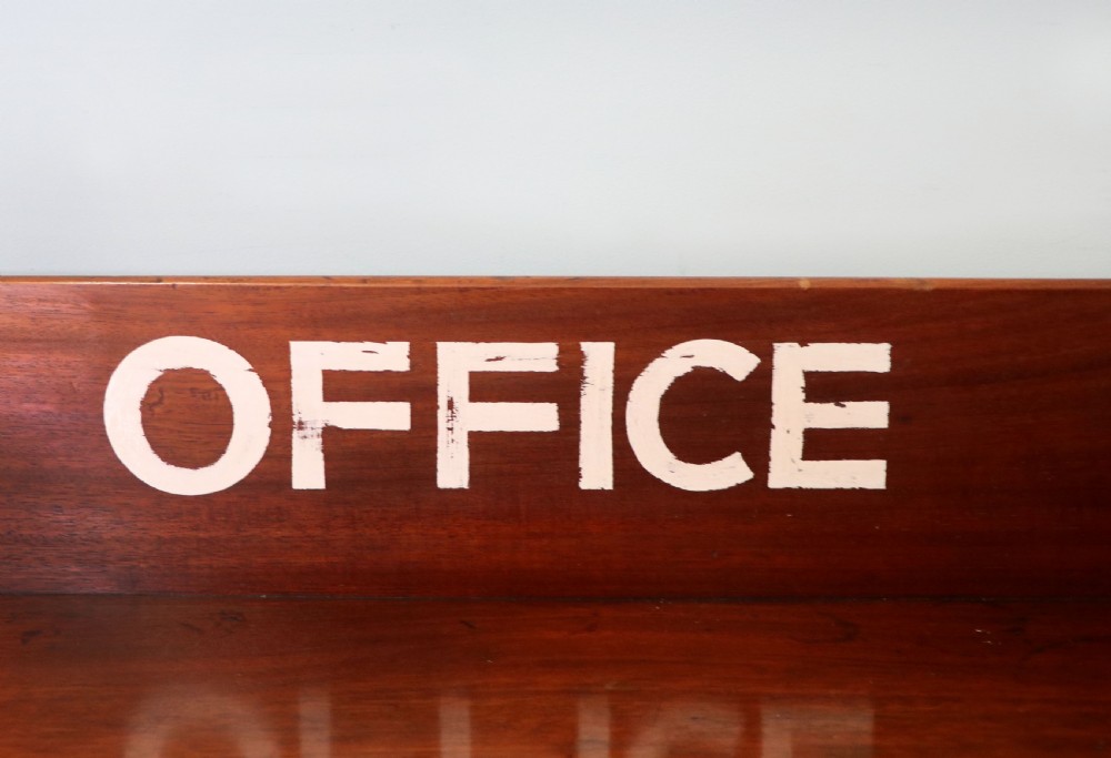 A lovely Victorian mahogany table later sign written booking office. View VII