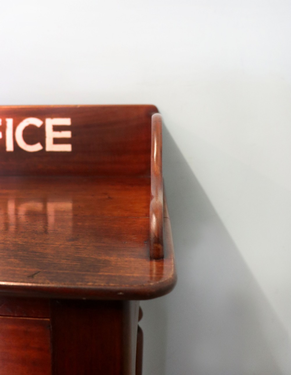 A lovely Victorian mahogany table later sign written booking office. View X