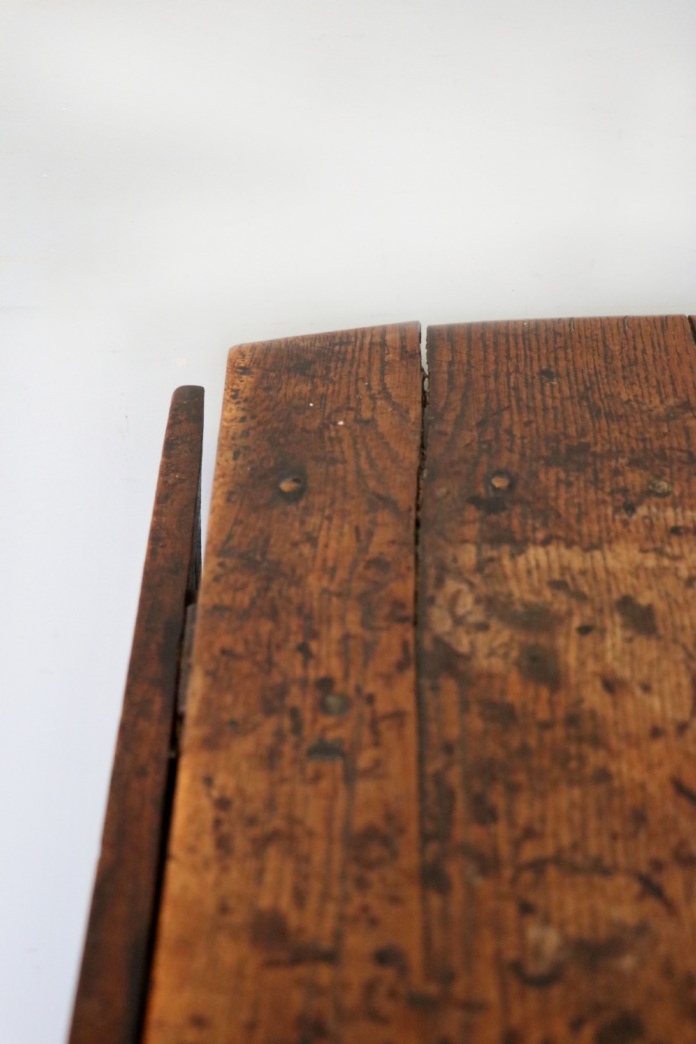 A lovely 18th century English oak drop leaf dining table. View VIII