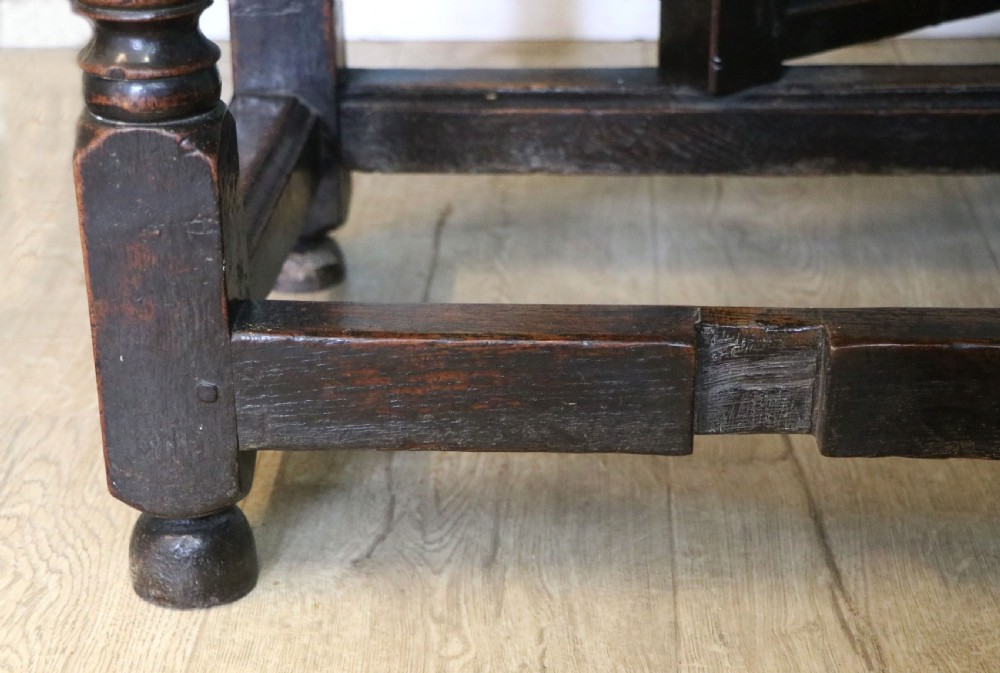 A lovely 18th century English oak drop leaf dining table. View XXIII