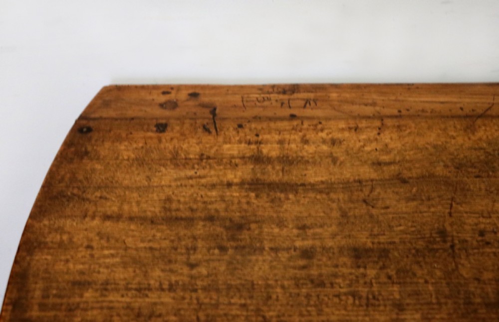 A lovely 18th century English oak drop leaf dining table.  View XVI