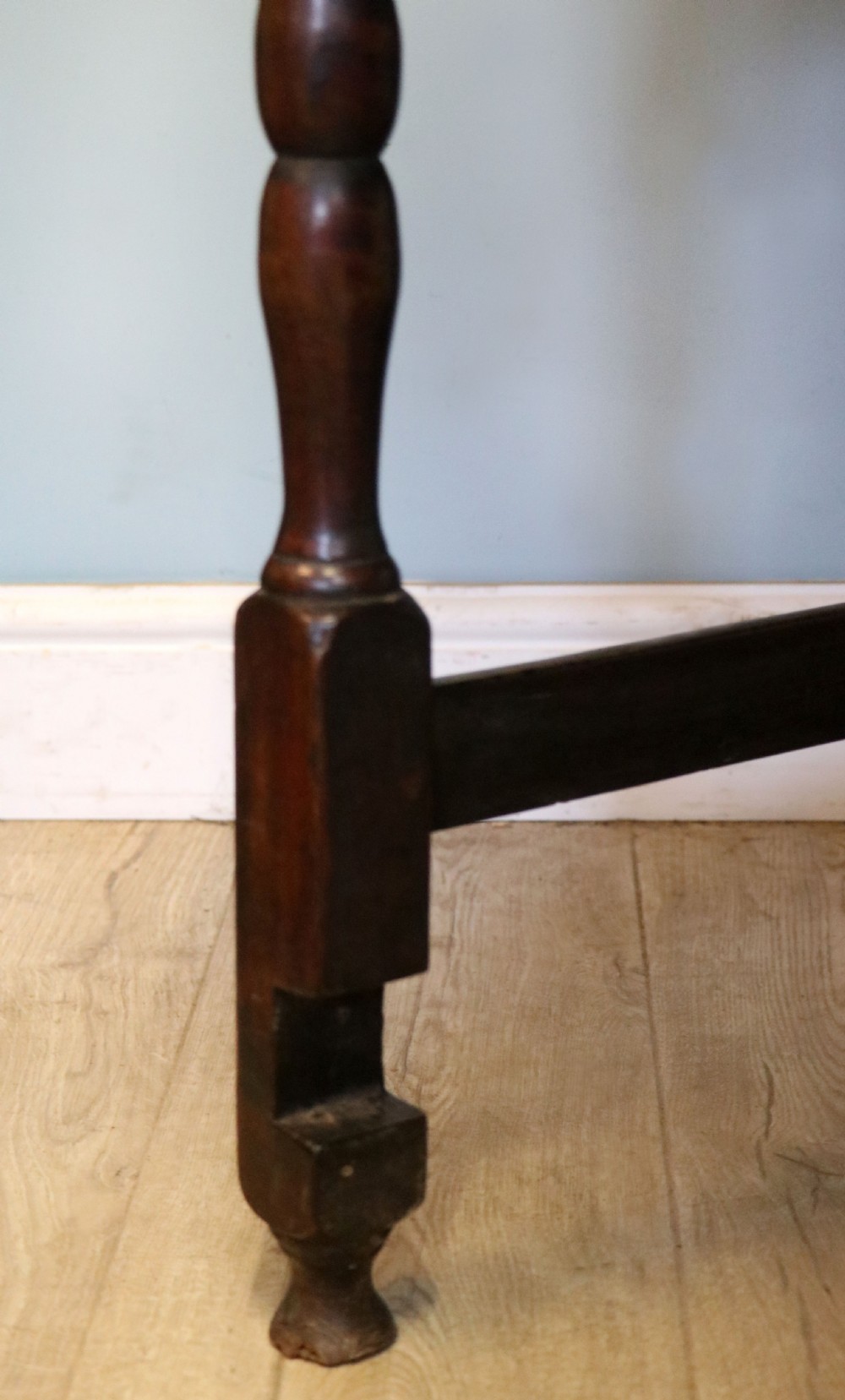 A lovely 18th century English oak drop leaf dining table.  View XXII