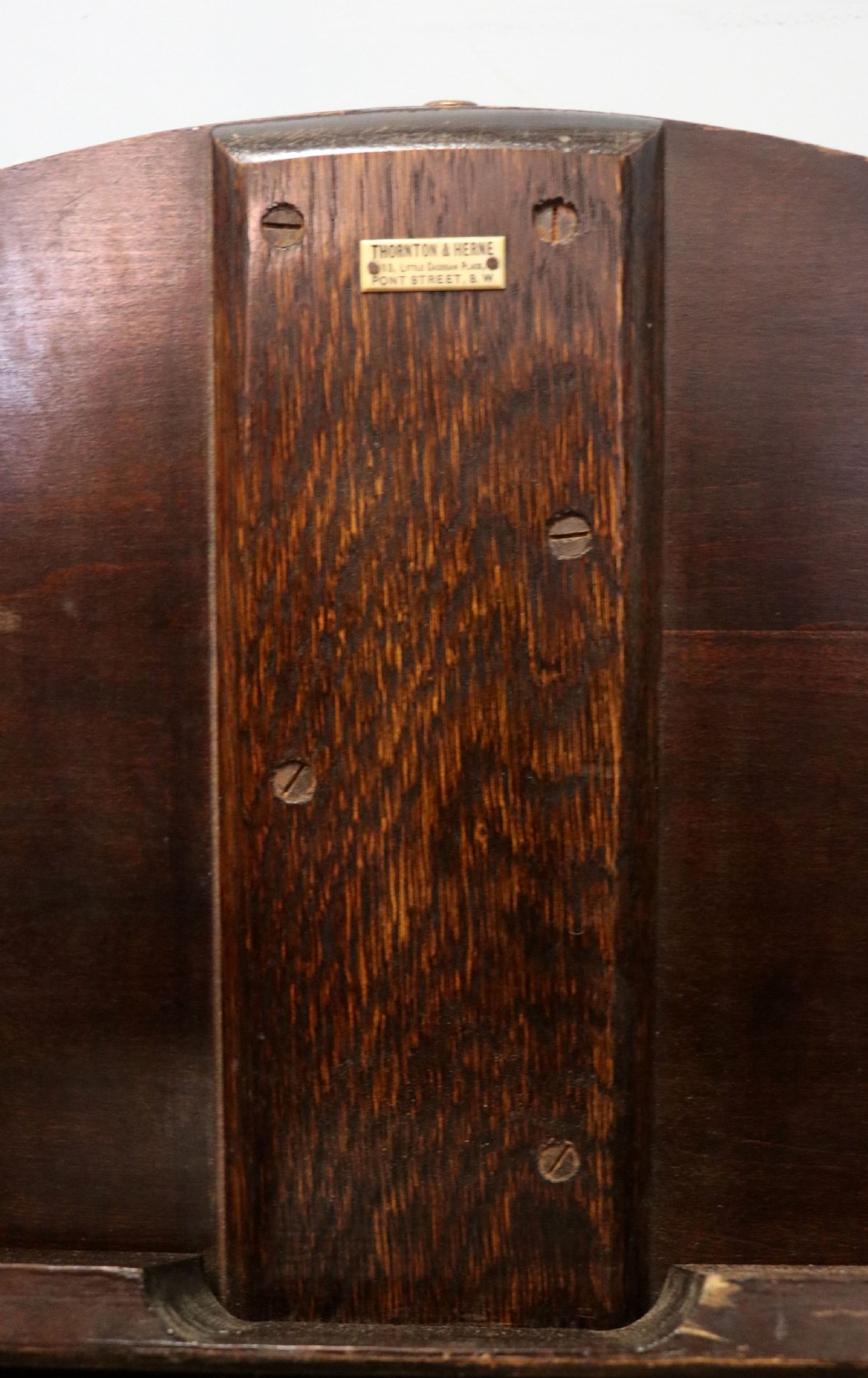 A early 20th century mahogany coaching or campaign table bearing a label for Thornton and Herne of Pont Street, London.  View VII