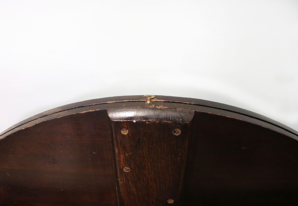 A early 20th century mahogany coaching or campaign table bearing a label for Thornton and Herne of Pont Street, London.  View XII