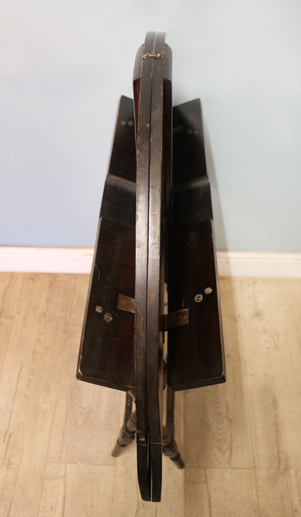 A early 20th century mahogany coaching or campaign table bearing a label for Thornton and Herne of Pont Street, London.  View XIV