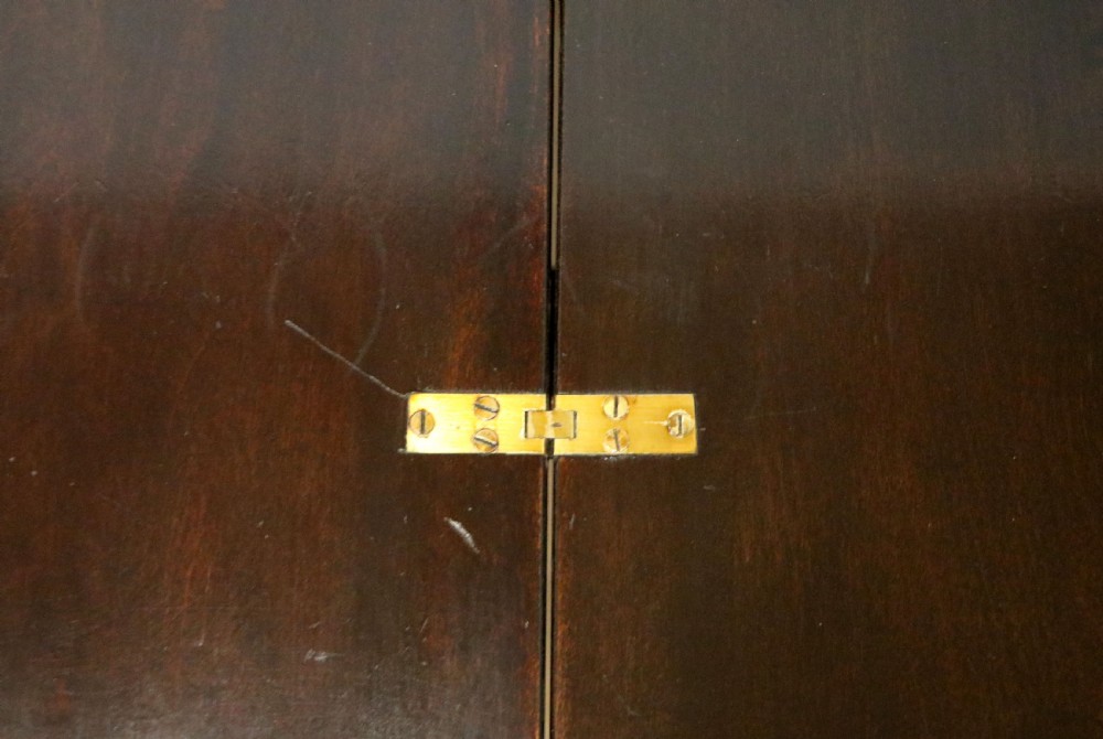 A early 20th century mahogany coaching or campaign table bearing a label for Thornton and Herne of Pont Street, London.  View XV