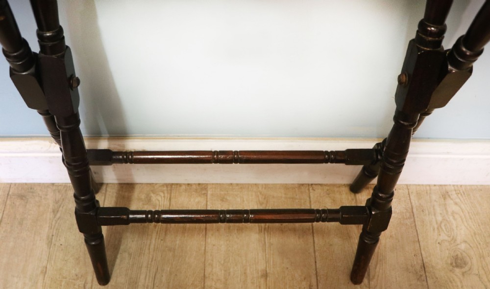 A early 20th century mahogany coaching or campaign table bearing a label for Thornton and Herne of Pont Street, London.  View XVII
