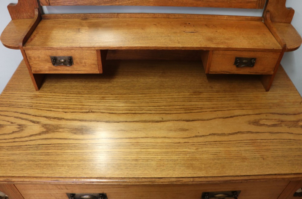 A lovely late 19th century light oak dressing chest View XI