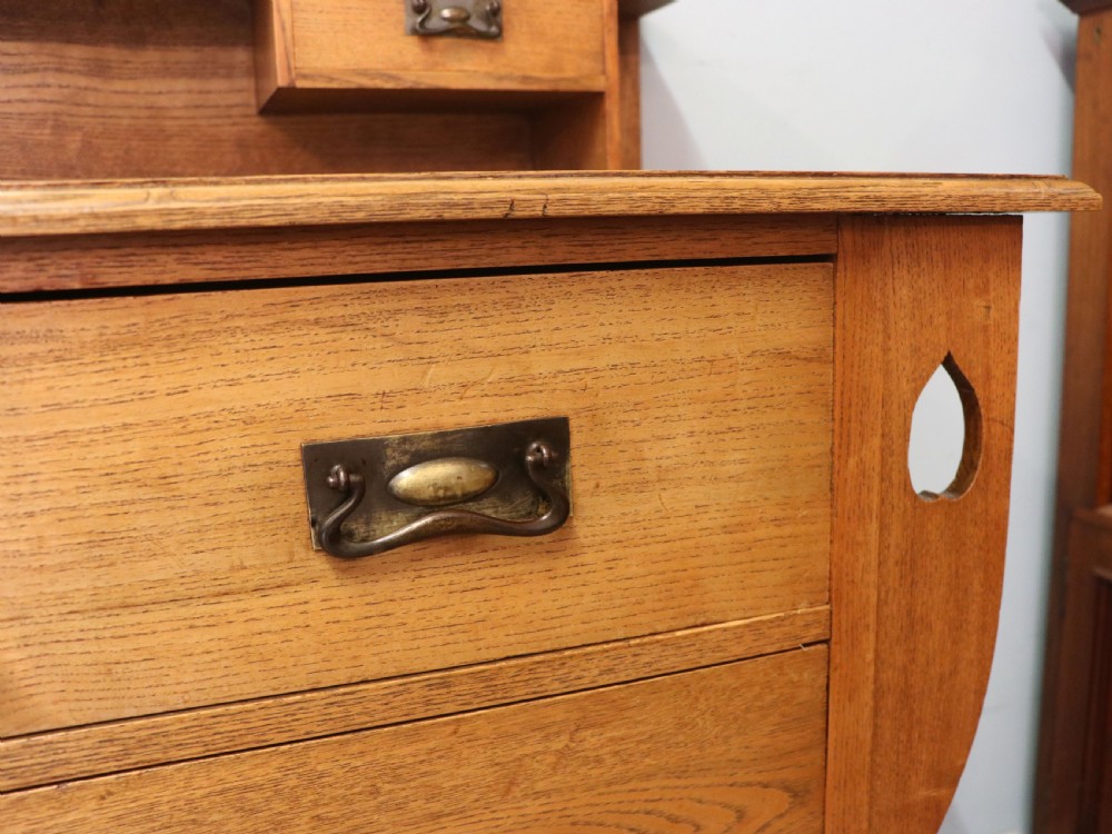 A lovely late 19th century light oak dressing chest View XVII