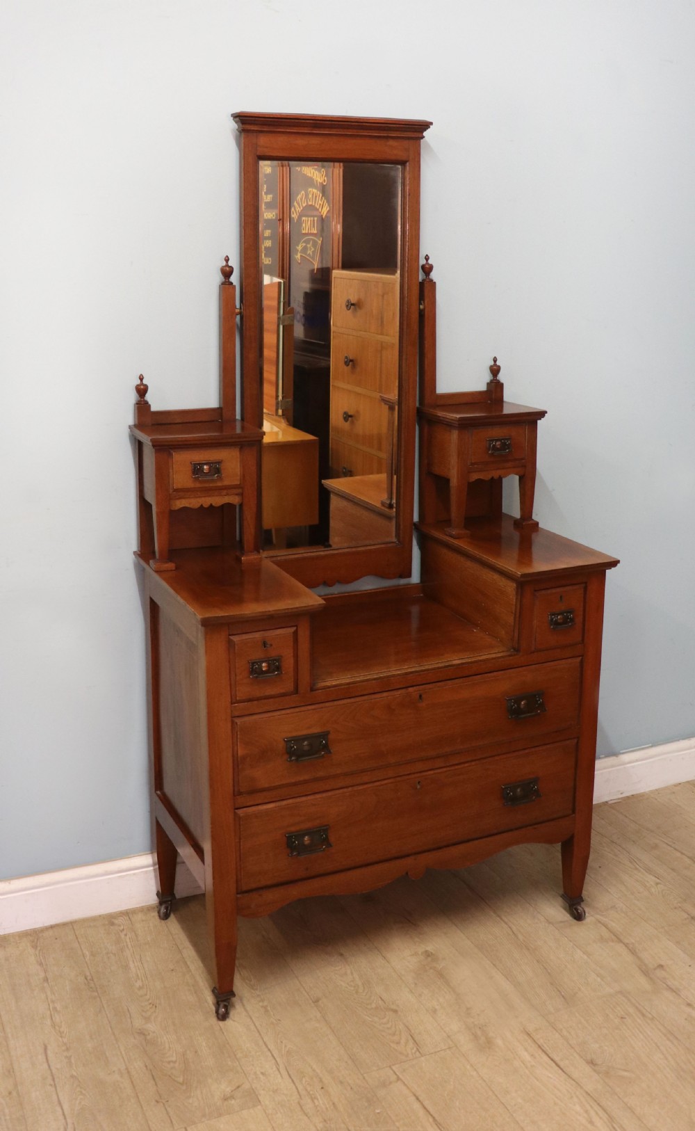 A lovely late 19th century American walnut dressing chest. View IV