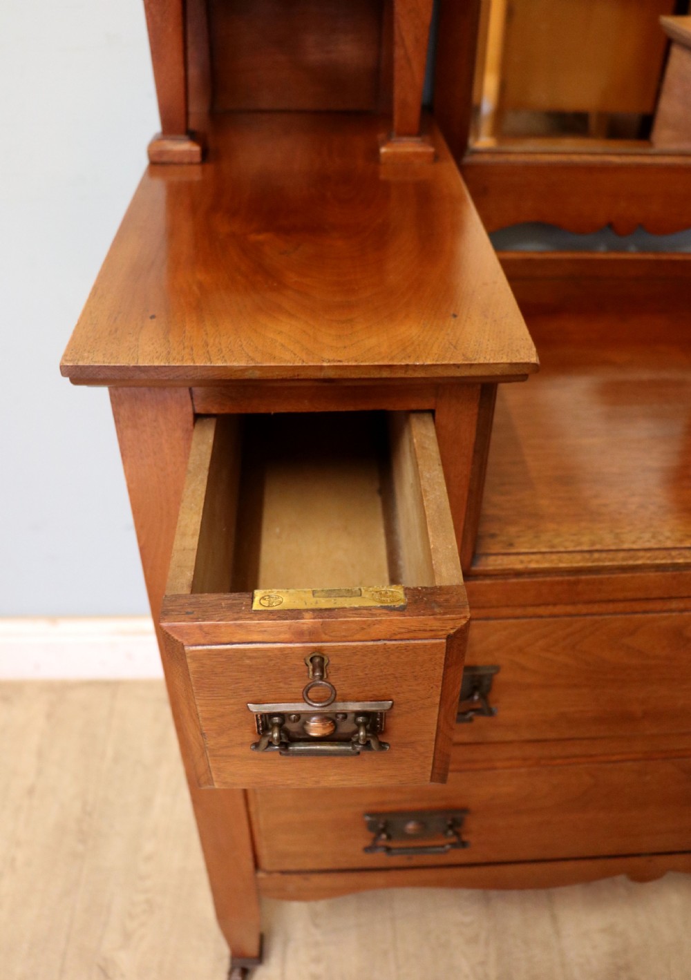 A lovely late 19th century American walnut dressing chest. View XVII