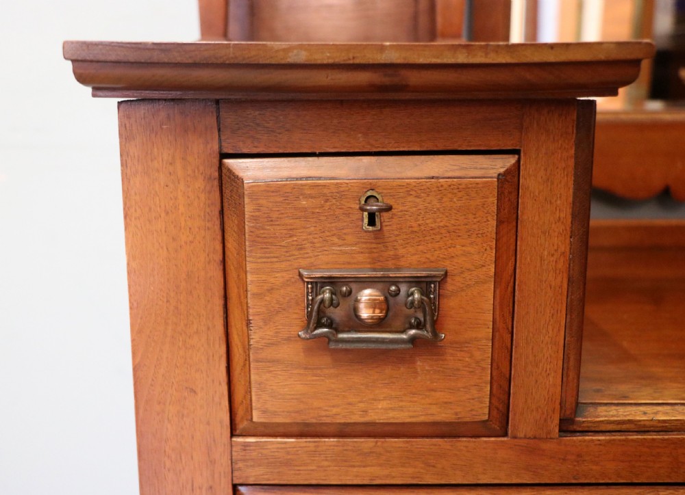 A lovely late 19th century American walnut dressing chest. View XVIII