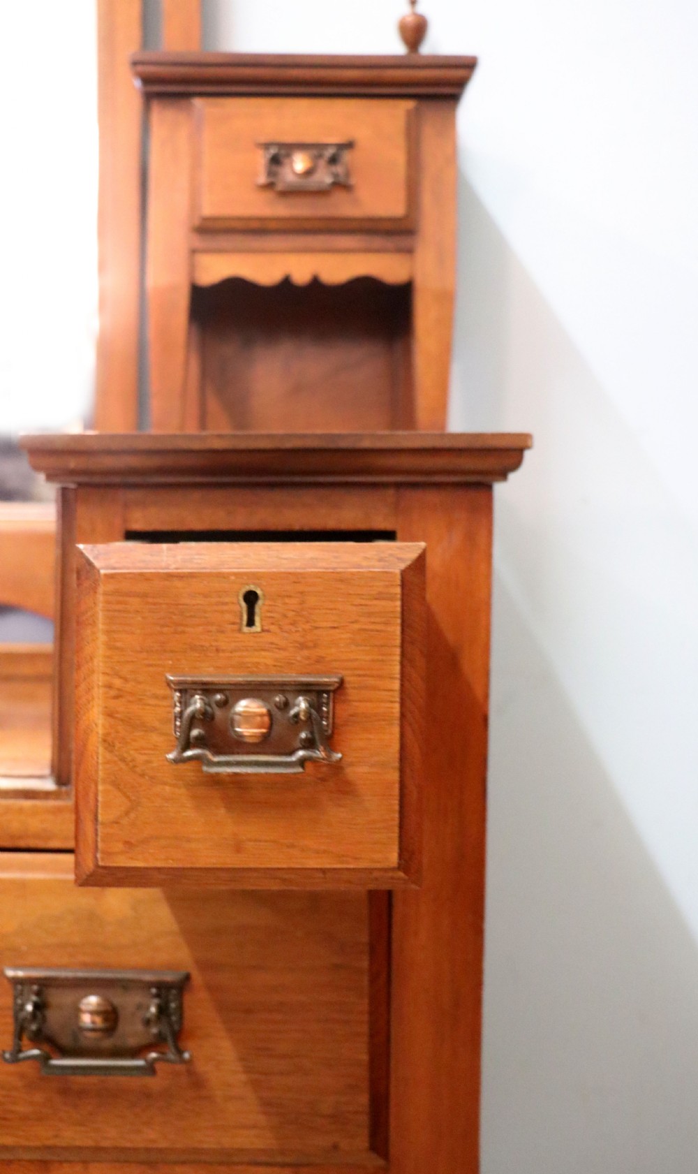 A lovely late 19th century American walnut dressing chest. View XIX