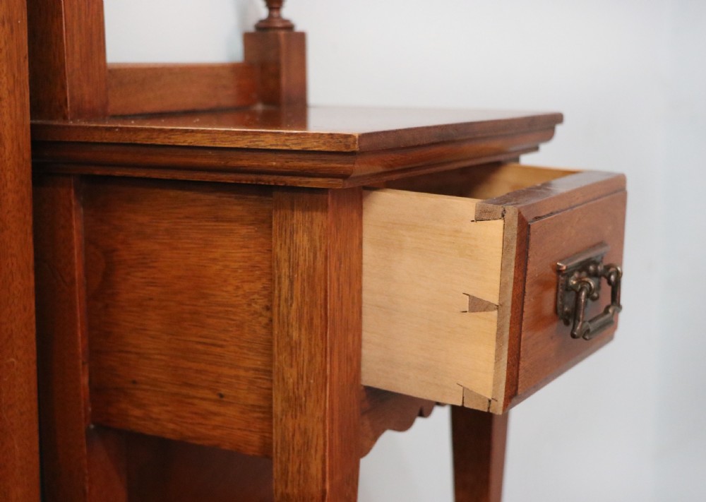A lovely late 19th century American walnut dressing chest. View XX