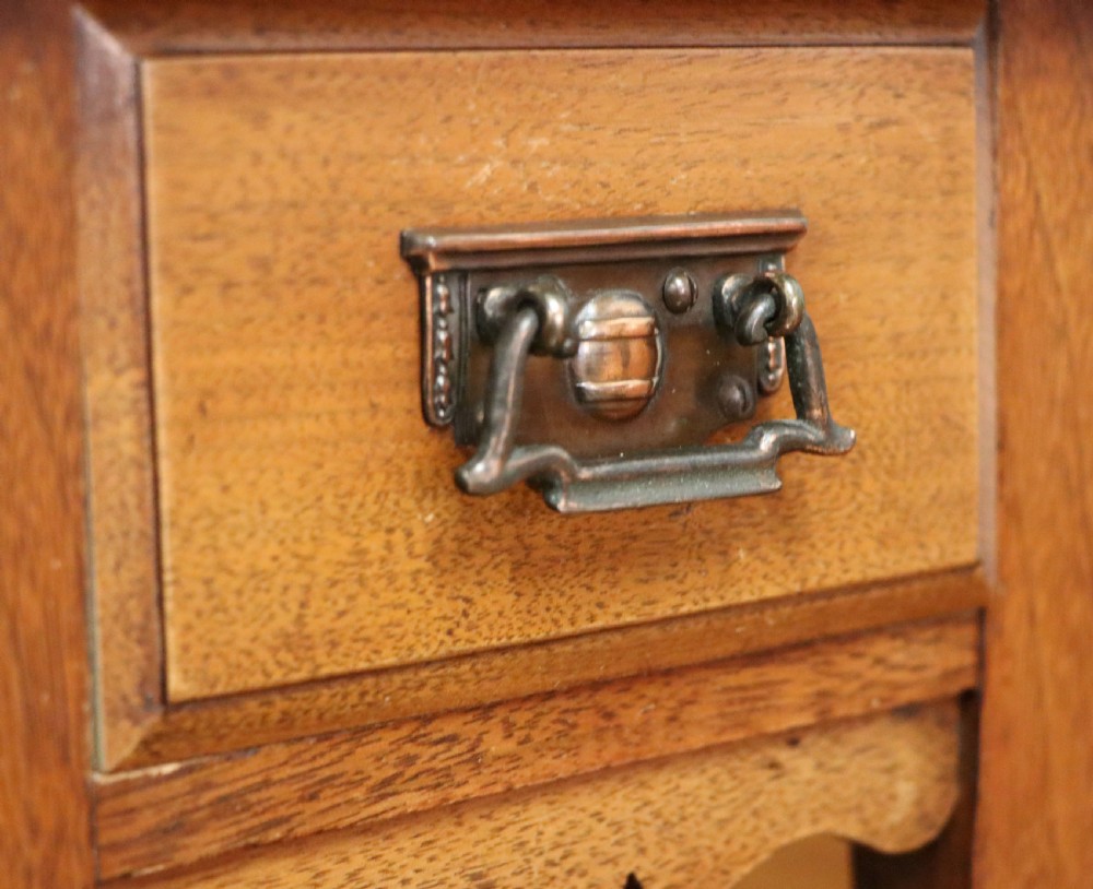 A lovely late 19th century American walnut dressing chest. View XXIV