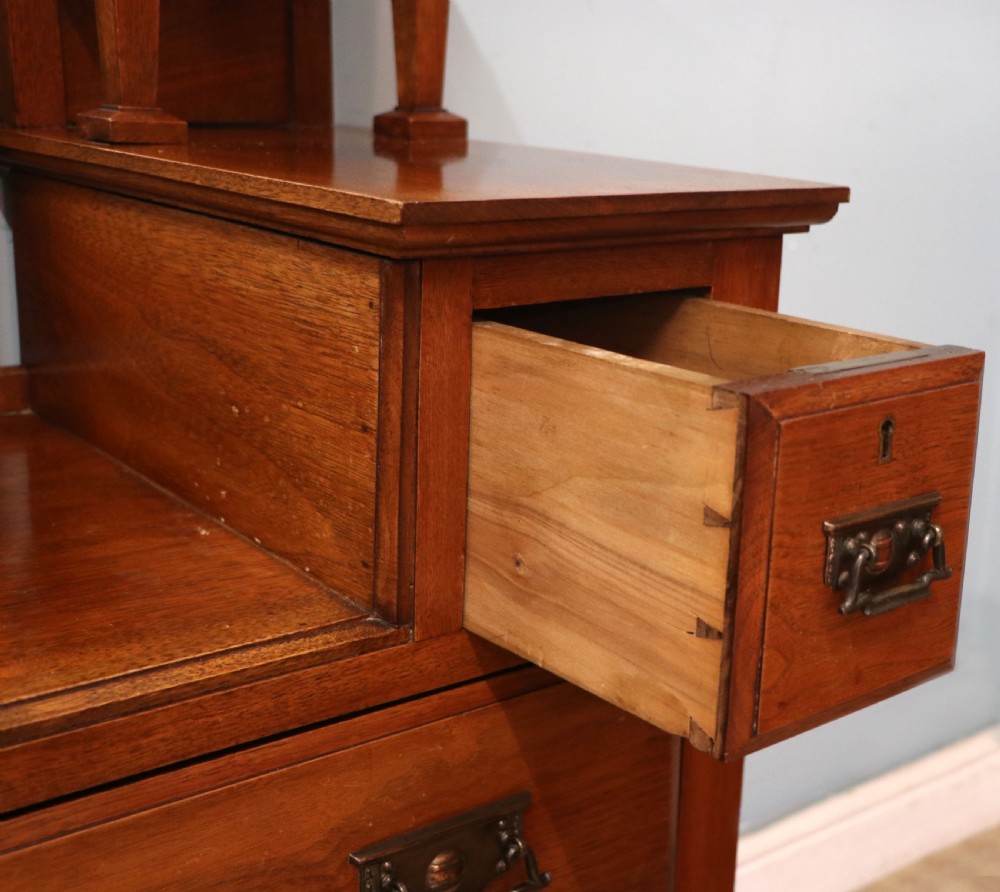 A lovely late 19th century American walnut dressing chest. View XXVII