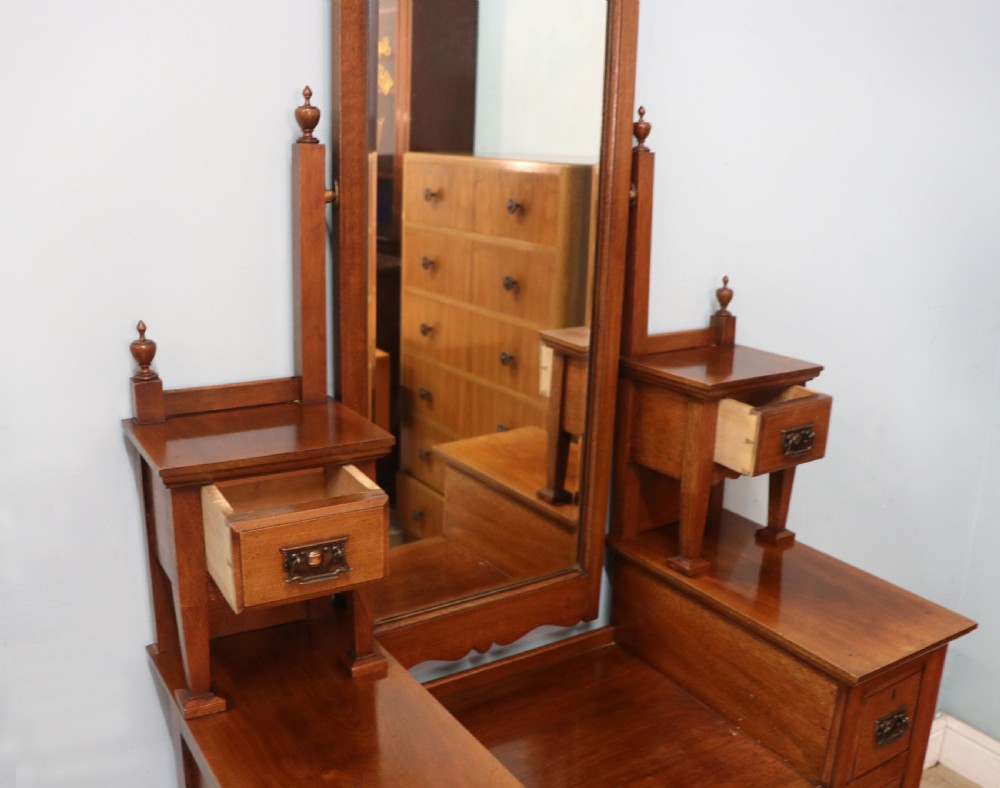 A lovely late 19th century American walnut dressing chest. View XXVIII