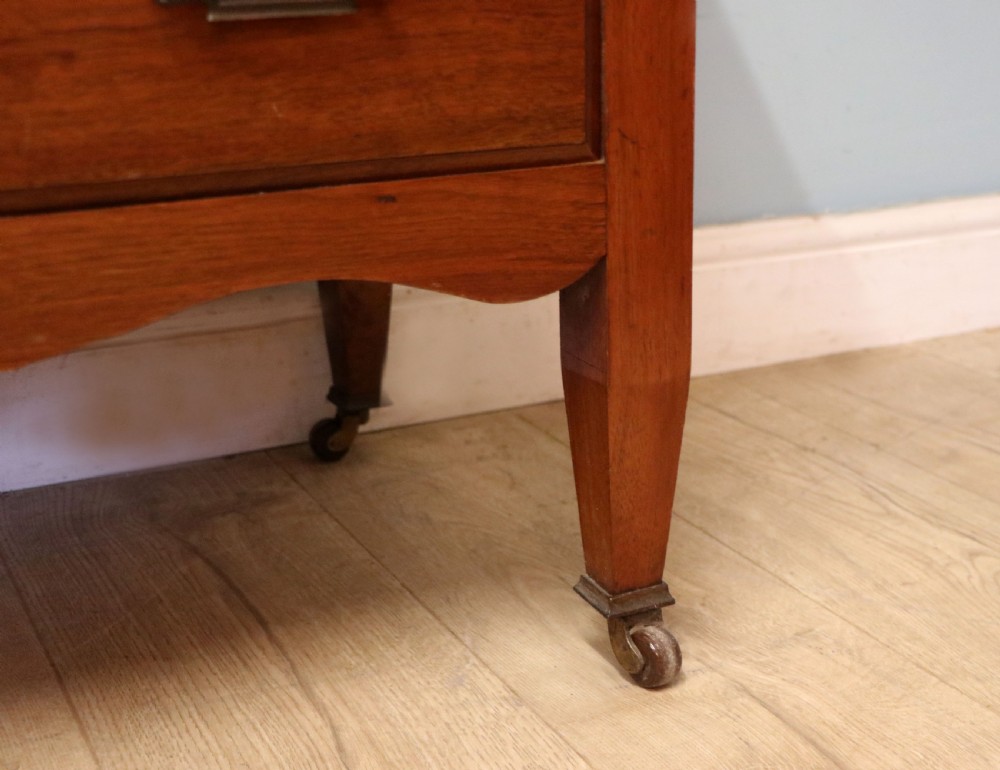 A lovely late 19th century American walnut dressing chest. View XXIX
