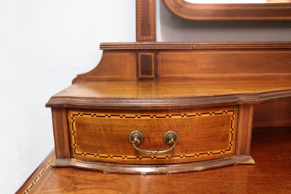 A fine quality Edwardian mahogany dressing table with inlaid decoration! View X