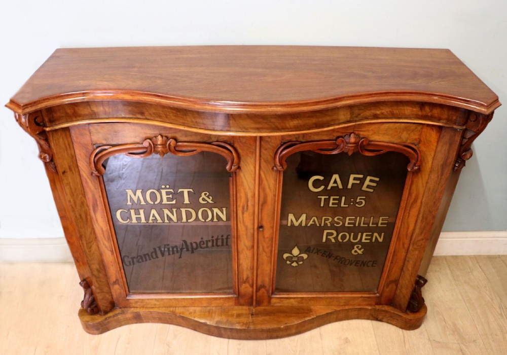  A lovely Victorian walnut & mahogany veneered sideboard of serpentine form. View III