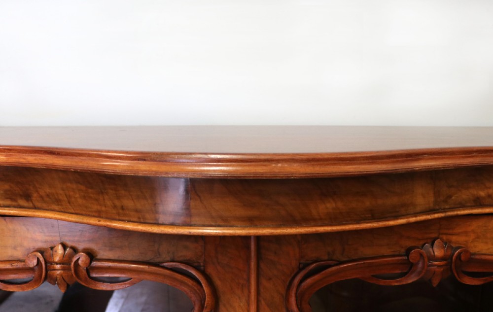  A lovely Victorian walnut & mahogany veneered sideboard of serpentine form. View VI