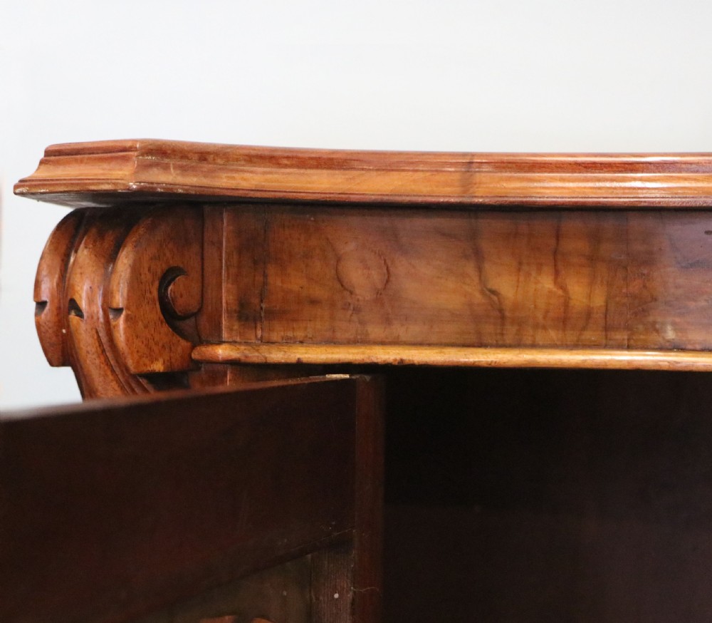  A lovely Victorian walnut & mahogany veneered sideboard of serpentine form. View VIII