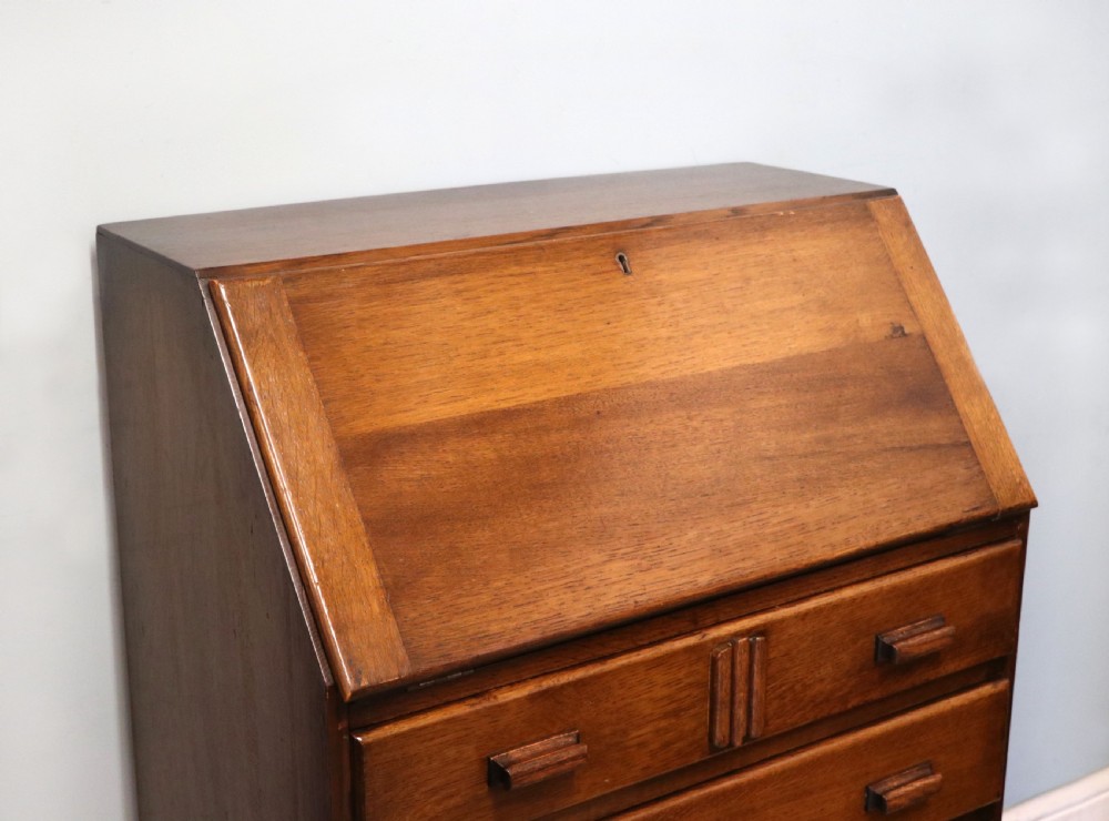 A really lovely & understated 1930s oak bureau. View VIII