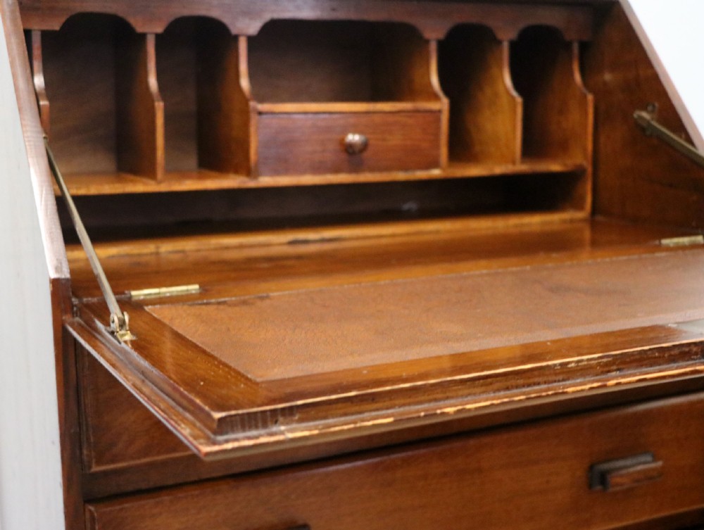 A really lovely & understated 1930s oak bureau. View XI
