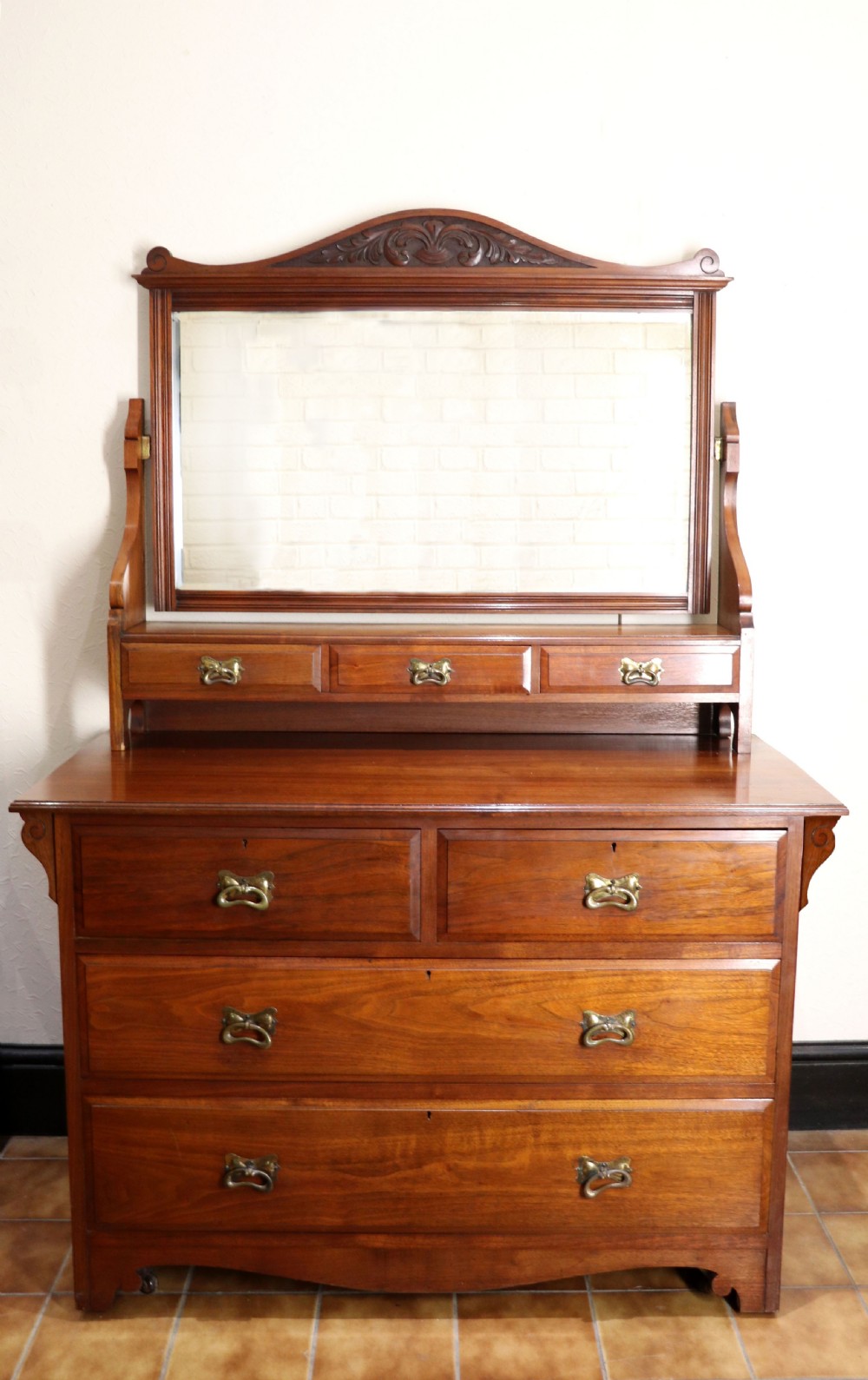 A late Victorian American walnut dressing chest.