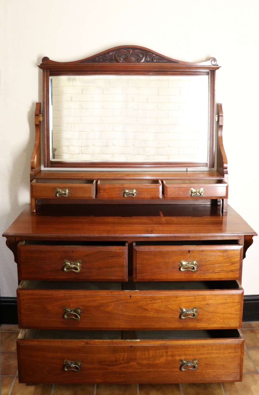 A late Victorian American walnut dressing chest. View II