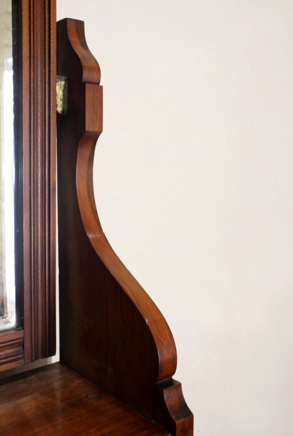 A late Victorian American walnut dressing chest. View VII