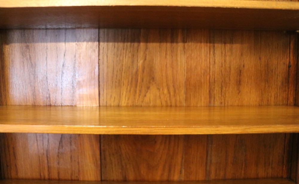  A wonderful Edwardian wall mounted solid oak framed display cabinet,  later sign written advertising Fry's Chocolate. View XIX