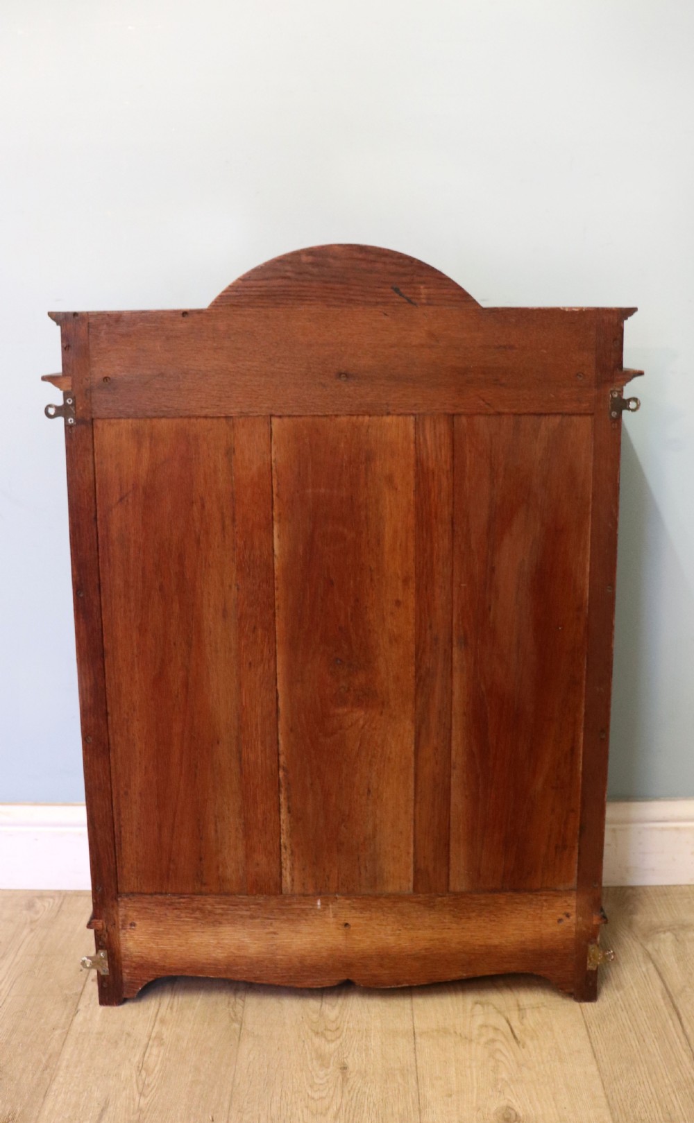  A wonderful Edwardian wall mounted solid oak framed display cabinet,  later sign written advertising Fry's Chocolate. View XXII