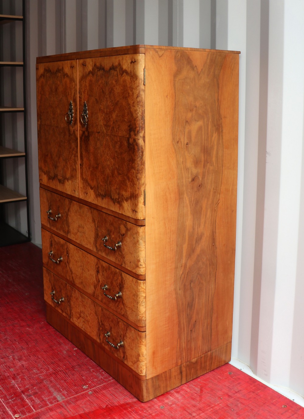 A 1930s burr walnut veneered tallboy cabinet. View IV