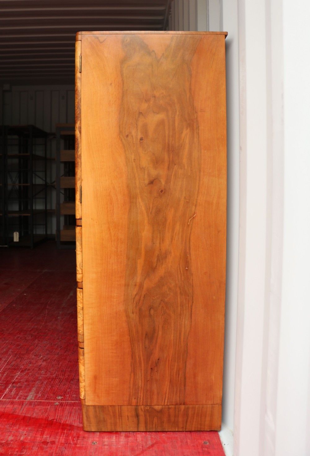 A 1930s burr walnut veneered tallboy cabinet. View VI