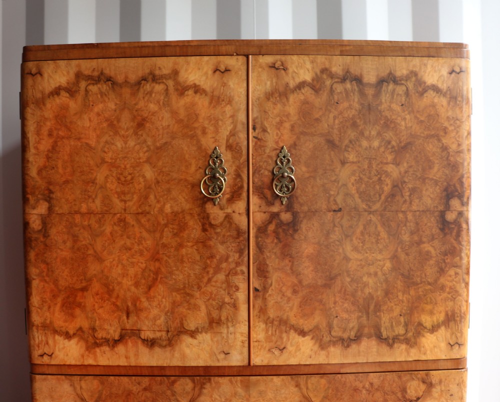 A 1930s burr walnut veneered tallboy cabinet. View VIII
