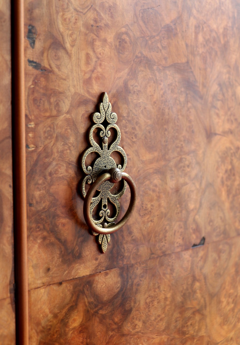 A 1930s burr walnut veneered tallboy cabinet. View XVI