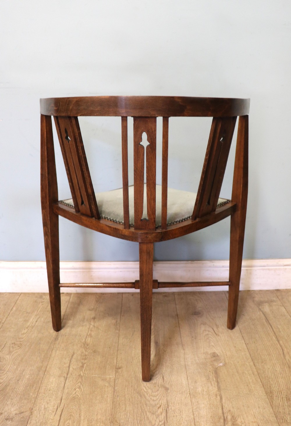 A pair of antique mahogany corner chairs featuring boxwood line inlay, pierced back splats, cross-braced legs, and green upholstered seats with stud trim. View XI