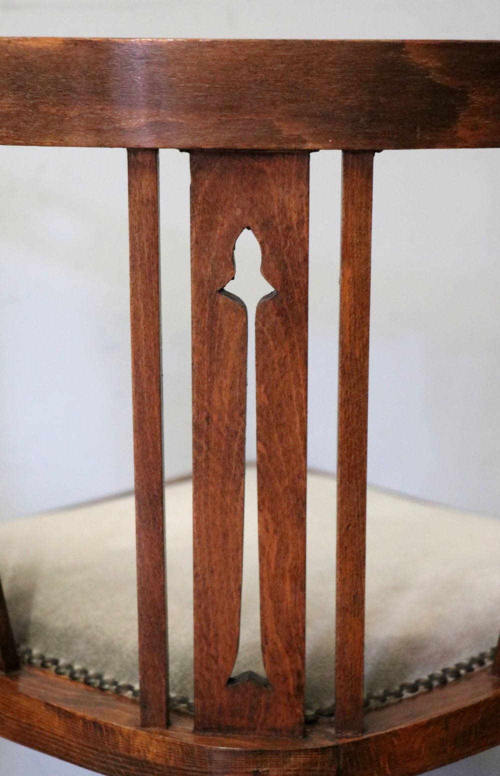 A pair of antique mahogany corner chairs featuring boxwood line inlay, pierced back splats, cross-braced legs, and green upholstered seats with stud trim. View XXII