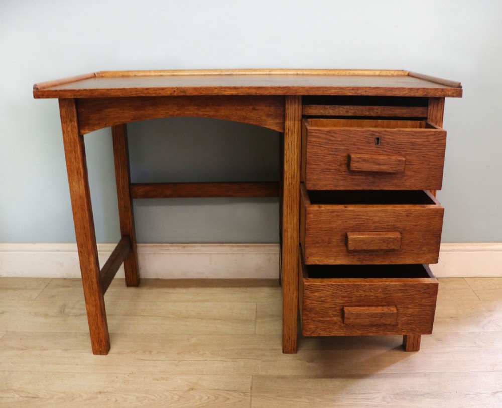 A vintage oak child’s desk. View IV