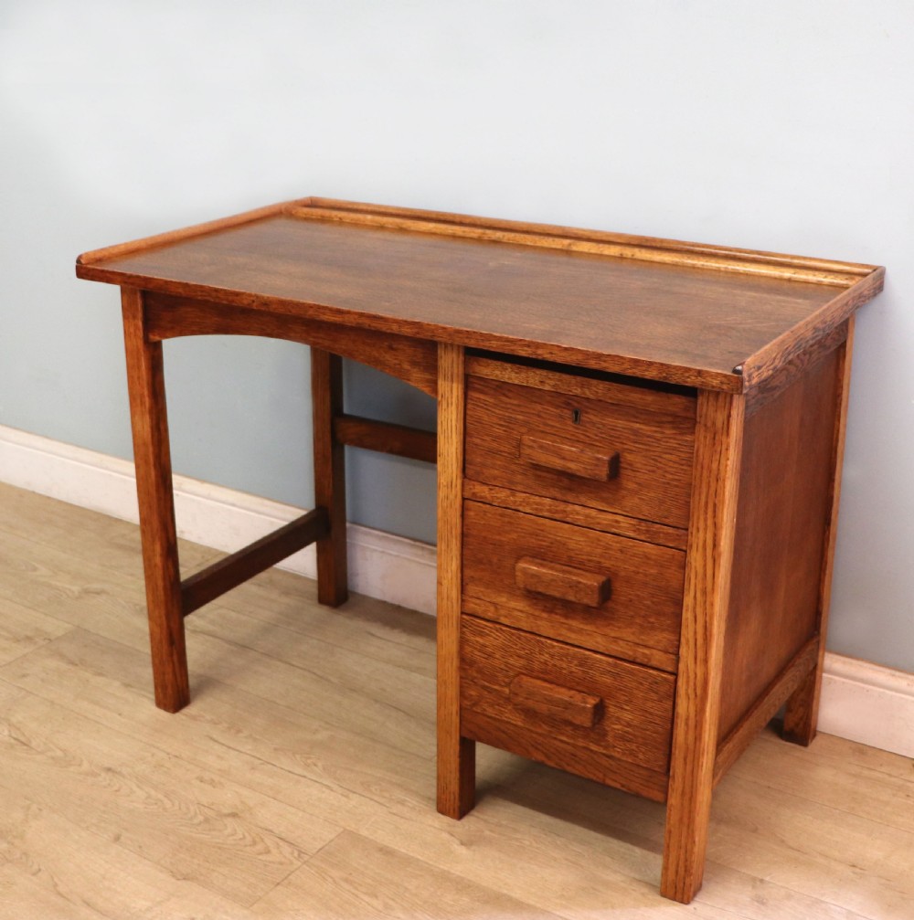 A vintage oak child’s desk. View VII