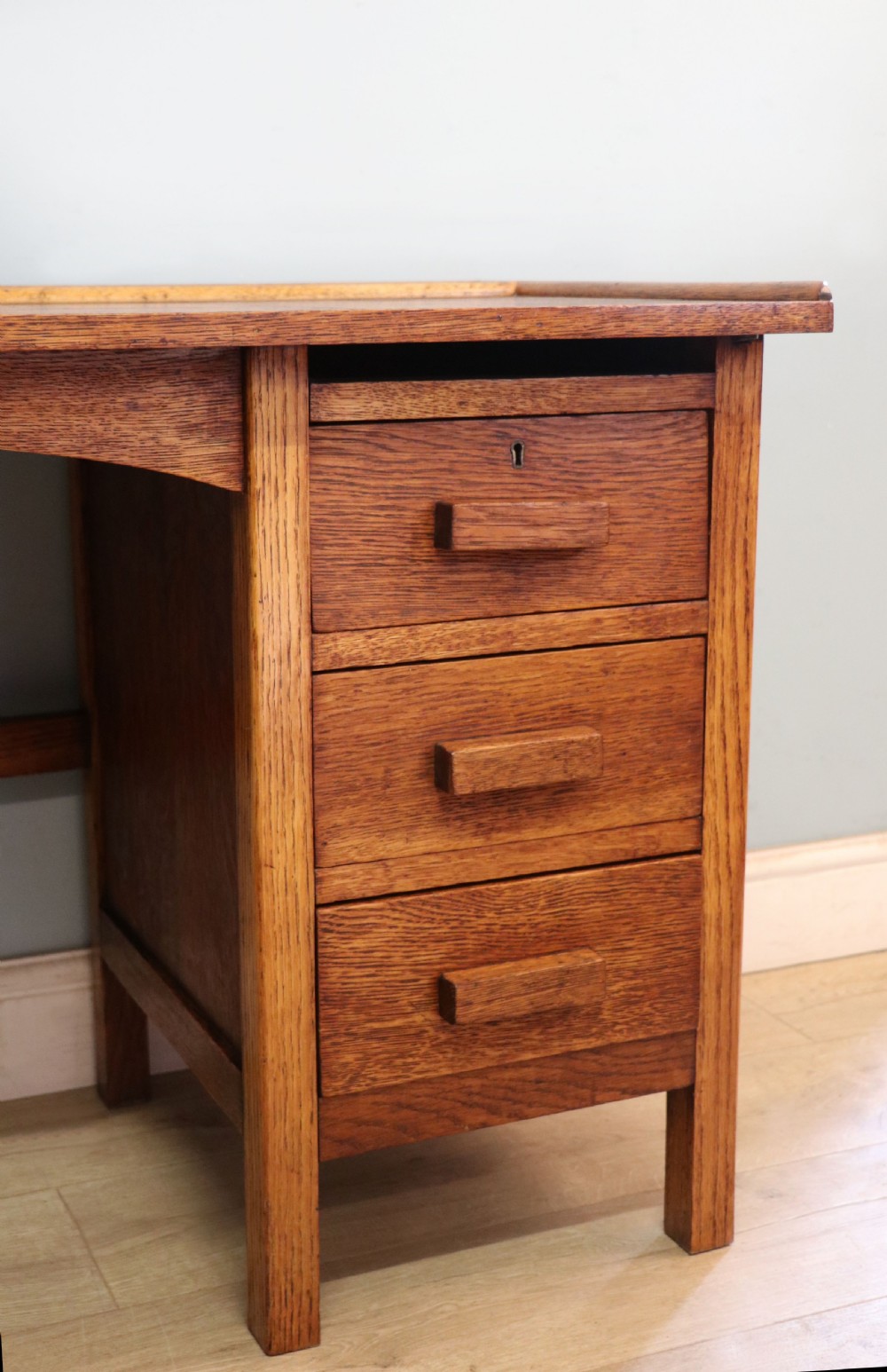 A vintage oak child’s desk. View XIV