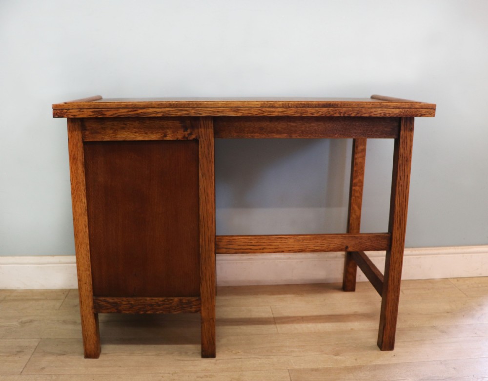 A vintage oak child’s desk. View XIX