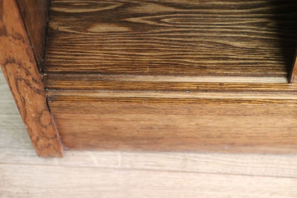  A 1930s/ 1940s oak bookcase or display cabinet decorated with the Associated Television logo. View XIV
