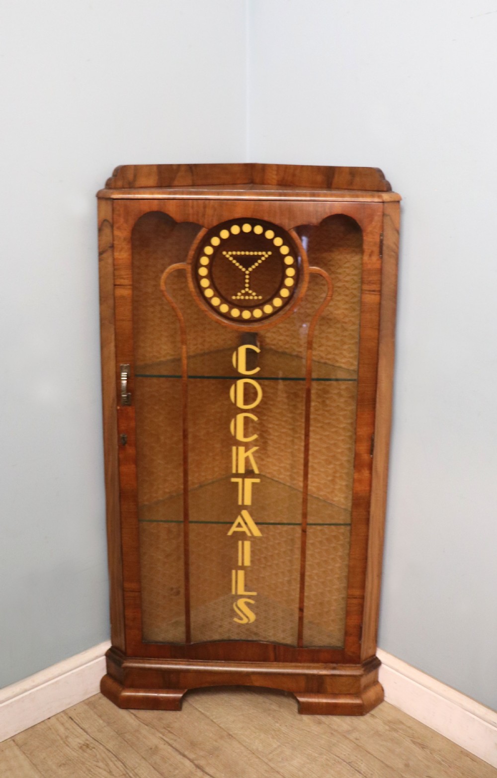 Art Deco period corner display cabinet later sign written for Cocktails. View II